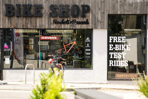 Premium Cervelo and Santa Cruz bicycles displayed inside the window Rockets and Rascals Poole